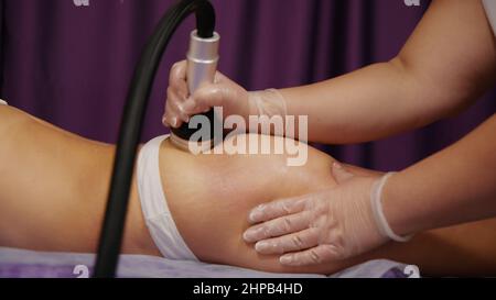 Woman was receiving treatment for cellulite. Slimming vacuum