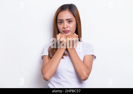afraid asian woman shocked covering mouth with hands for mistake. Secret concept isolated on white background Stock Photo