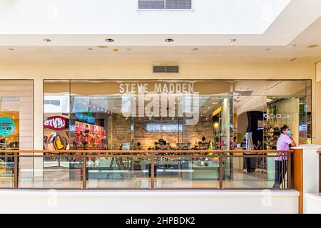 Miami, USA - July 19, 2021: Sign for Steve Madden shoes clothing store fashion inside of Aventura shopping mall in Florida, United States Stock Photo