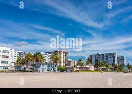 Miami, USA - July 21, 2021: Hollywood Beach in Florida colorful art deco blue house apartment building retro vintage style architecture on sunny day b Stock Photo