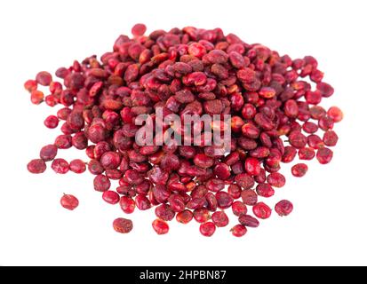 Sumac seeds isolated on white background. Whole dry Rhus berry Stock Photo