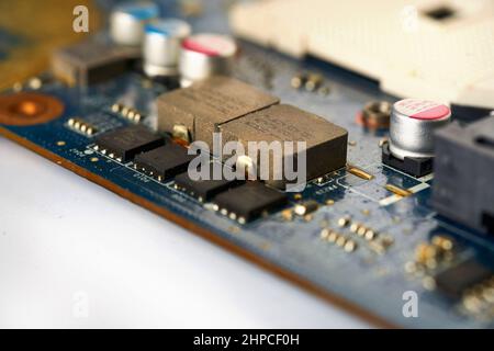 Old computer system unit with spider web and dust inside. Stock Photo