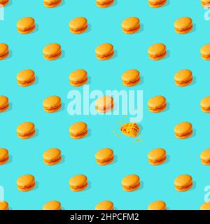 french delicacy - macaroons with shadow on blue background, seam Stock Photo