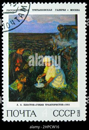 MOSCOW, RUSSIA - NOVEMBER 4, 2021: Postage stamp printed in Soviet Union shows Dinner of Tractor Drivers, Arkady Plastov (1951), Soviet Paintings seri Stock Photo