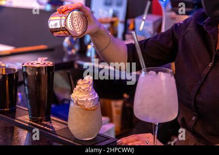 Photo of a bartender making a cocktail Stock Photo