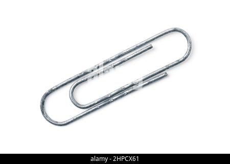 Old steel paper clip isolated on white Stock Photo