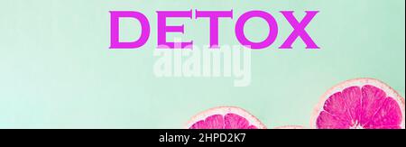 Fresh tasty grapefruits on pastel background. Fresh summer tropical fruits.detox diet and weight loss concepts, banner, advertising for a store Stock Photo