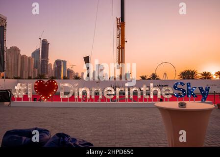 Dinner in the sky restaurant in front of Iconic Dubai Marina district. Stock Photo