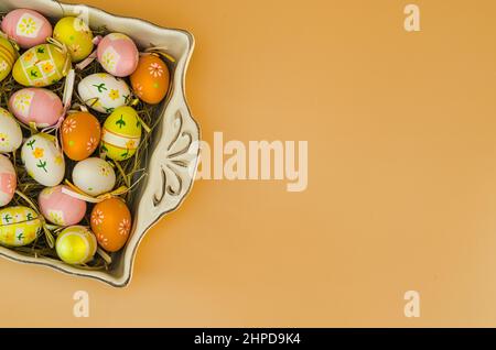 Easter background with painted easter eggs. Stock Photo