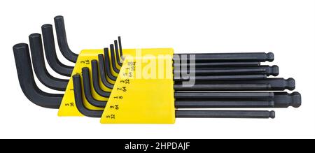 Black Allen key set of blued steel in yellow tool box isolated on white background. Close-up of metal various sized hex L wrenches kit with ball ends. Stock Photo