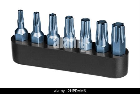 Metal security torx bits set with hole in center and hex shank isolated on white background. Closeup of steel star screwdrivers kit in plastic toolbox. Stock Photo