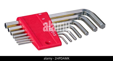Metal Allen wrench toolkit in a plastic holder. Closeup of hex key set in red toolbox with metric scale. Steel bolting hand tool kit of various sizes. Stock Photo
