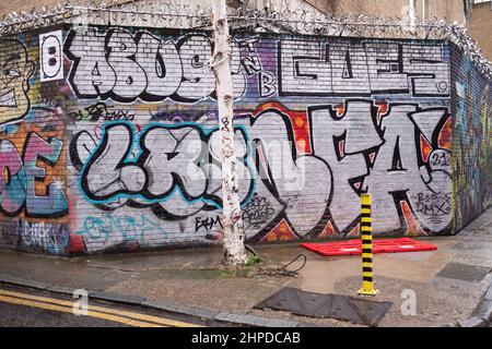 Graffiti on the corner of Grey Eagle Street and Quaker Street, Spitalfields E1 London UK. This area is a hotbed of street art. Stock Photo