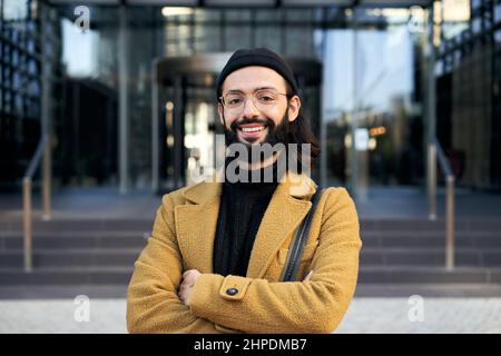Portrait of young new workers happy smiling at camera. Entrepreneur cheerful people  Stock Photo