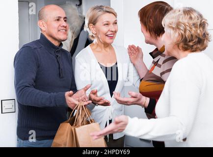 Mature friends are talking about their leisure Stock Photo