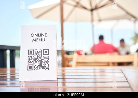 Table with a QR code for contactless access to the digital menu of the ...