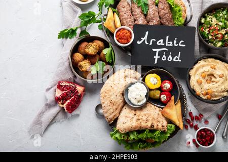 Lebanese food assortment on light background. Traditional food concept. Top view, flat lay, copy space Stock Photo