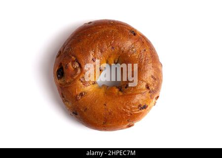 A Single Cinnamon Raisin Bagel Isolated on a White Background Stock Photo