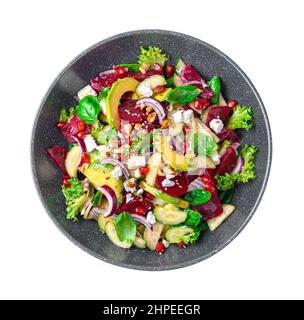 Vegetable salad with beetroot, avocado, cucumber and feta cheese is isolated on a white background. Top view. Stock Photo