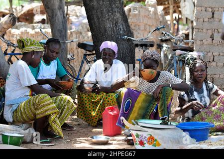 Burkinabe women at a local weekly market in central Burkina Faso. Stock Photo