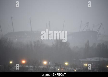 Manchester, UK, 21st February, 2022. Rain lashes the Etihad Stadium, home of Manchester City Football Club. Non- stop rain and violent gales in central Manchester, as Storm Franklin arrives. A yellow weather warning for wind remains in place for this area until 1pm today.  Credit: Terry Waller/Alamy Live News Stock Photo