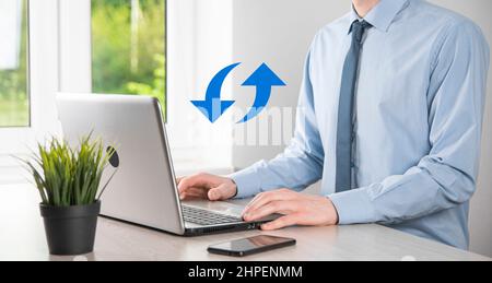 Cloud technology. Polygonal wireframe cloud storage sign with two arrows up and down on dark . Cloud computing, big data center, future infrastructure Stock Photo