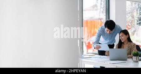 Business Asian People Analyzing Statistics Business Documents, Financial Concept Stock Photo