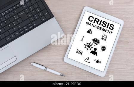 Crisis management concept shown on a digital tablet Stock Photo