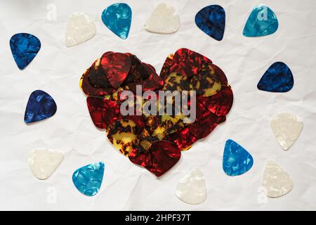 Heart-shaped made from guitar picks Stock Photo