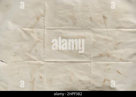 Old folded yellow paper texture background Stock Photo
