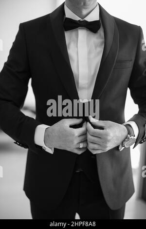 Groom in suit, black and white Stock Photo