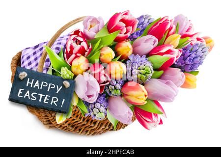 Label and Happy Easter with colorful springtime flowers in a basket on white background Stock Photo