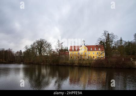 Bannewitz, Germany. 21st Feb, 2022. The Grillenburg hunting lodge in the Tharandt Forest near the city of Dresden was built in 1554. It served as a hunting lodge for the former Elector of Saxony August the Strong. Credit: Daniel Schäfer/dpa-Zentralbild/dpa/Alamy Live News Stock Photo