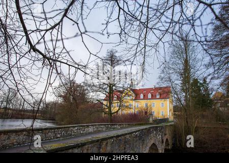 Bannewitz, Germany. 21st Feb, 2022. The Grillenburg hunting lodge in the Tharandt Forest near the city of Dresden was built in 1554. It served as a hunting lodge for the former Elector of Saxony August the Strong. Credit: Daniel Schäfer/dpa-Zentralbild/dpa/Alamy Live News Stock Photo