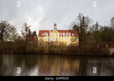 Bannewitz, Germany. 21st Feb, 2022. The Grillenburg hunting lodge in the Tharandt Forest near the city of Dresden was built in 1554. It served as a hunting lodge for the former Elector of Saxony August the Strong. Credit: Daniel Schäfer/dpa-Zentralbild/dpa/Alamy Live News Stock Photo