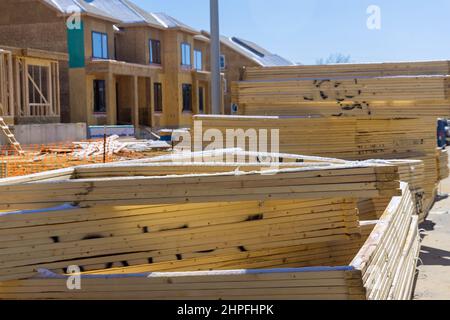 Packs of lumber at the natural materials from wood with roof rafters for building a house Stock Photo