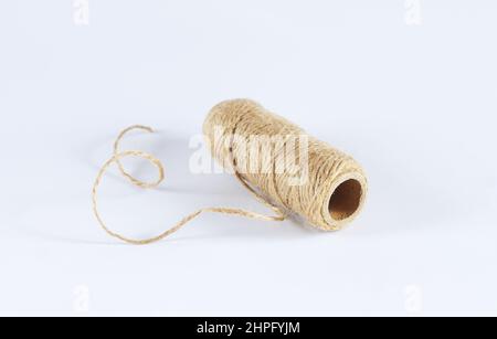 Natural jute twine rope skein isolated on white background Stock Photo