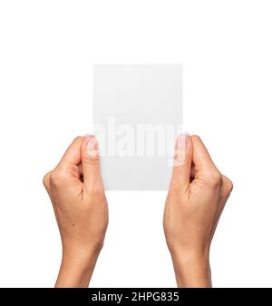 Hand holding white cards on white Stock Photo