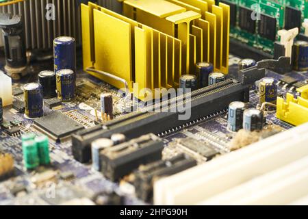 Old computer system unit with spider web and dust inside. Stock Photo