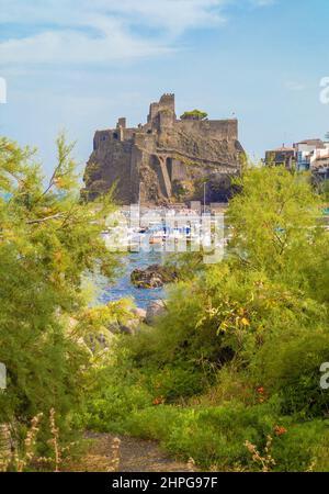 Aci Trezza (Italy) - A view of tourist fishing village, in municipality of Aci Castello, metropolitan city of Catania, Sicily island and region. Stock Photo