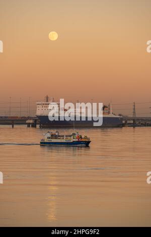 Norsky Ro-Ro ferry moored at Tilbury 2 from Gravesend Kent with a full moon rising behind Stock Photo