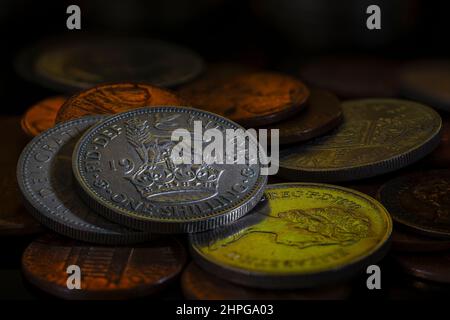 King George VI One Shilling Coin Reverse 1948 on pile of coins Close up Stock Photo