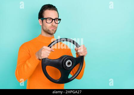 Profile side photo of young guy drive automobile vehicle serious speed isolated over turquoise color background Stock Photo