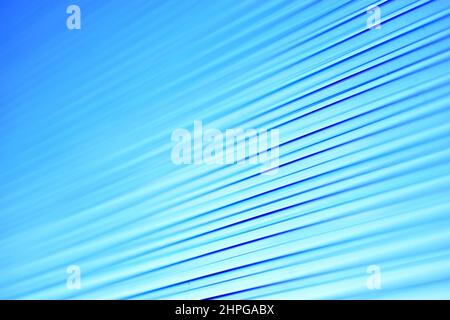 Blue bright stripes of polycarbonate in the light Stock Photo