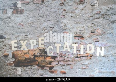 The expectations word on the wall. Business Concept image. Expectation Prediction Hope Strategy Planning Concept. Stock Photo