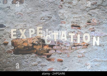 The expectations word on the wall. Business Concept image. Expectation Prediction Hope Strategy Planning Concept. Stock Photo