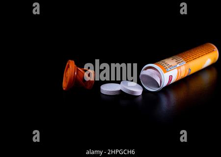 Selective focus on multivitamins effervescent tablets isolated on black. Bucharest, Romania, 2021 Stock Photo