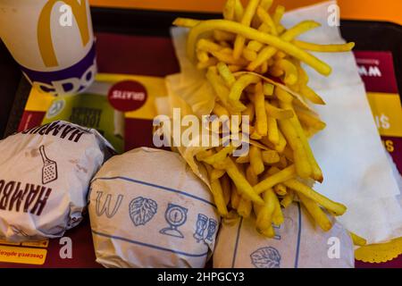 McDonald's burger and french fries with cold drink in Bucharest, Romania, 2021 Stock Photo