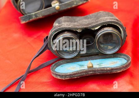 Italy, Lombardy, Flea Market, Ancient Binoculars with Leather Bag Cover Stock Photo