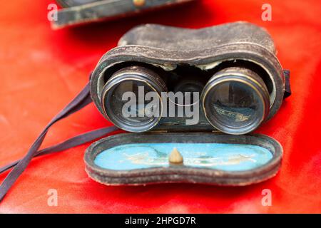 Italy, Lombardy, Flea Market, Ancient Binoculars with Leather Bag Cover Stock Photo